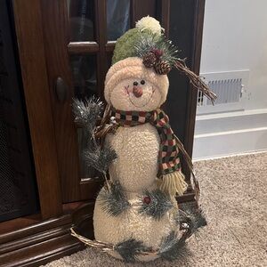Festive Snowman Holiday Decoration with Green Hat and Scarf